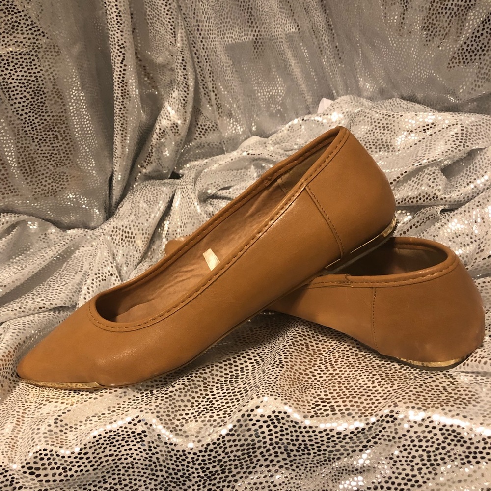 pointed tan flats, with gold trim like new